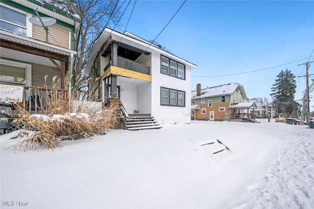 view of snow covered property