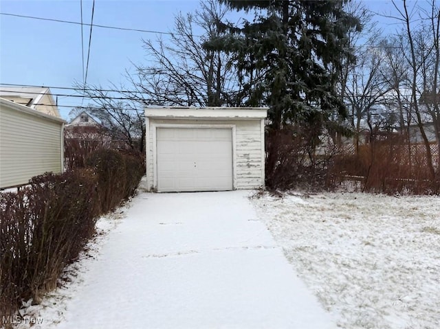 view of snow covered garage