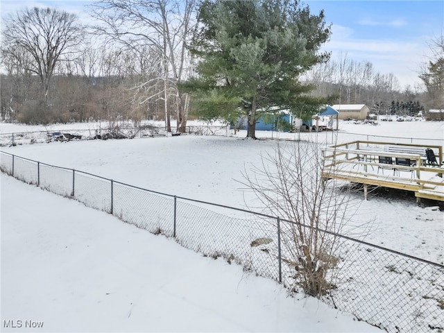 view of yard covered in snow