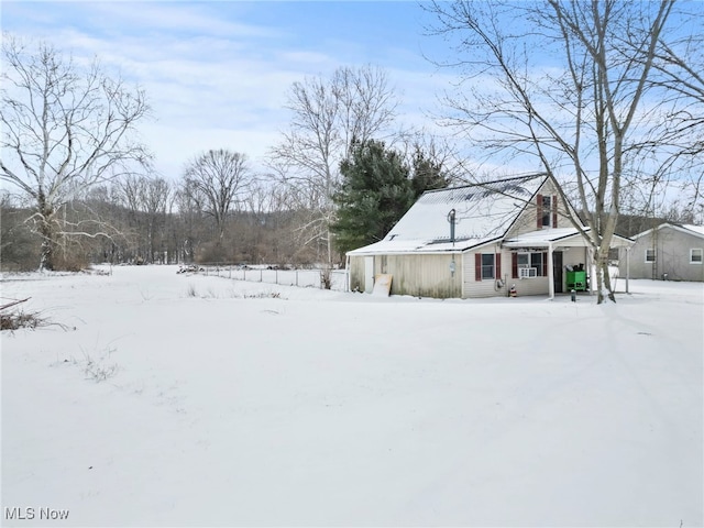 view of yard covered in snow