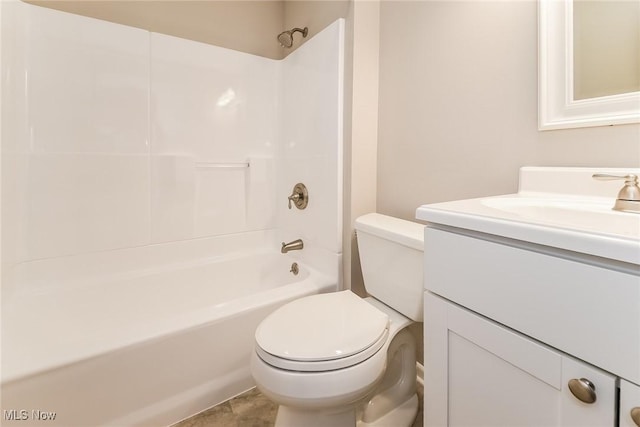 full bathroom featuring vanity, bathing tub / shower combination, and toilet