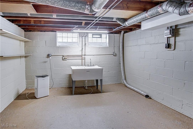 basement featuring a sink