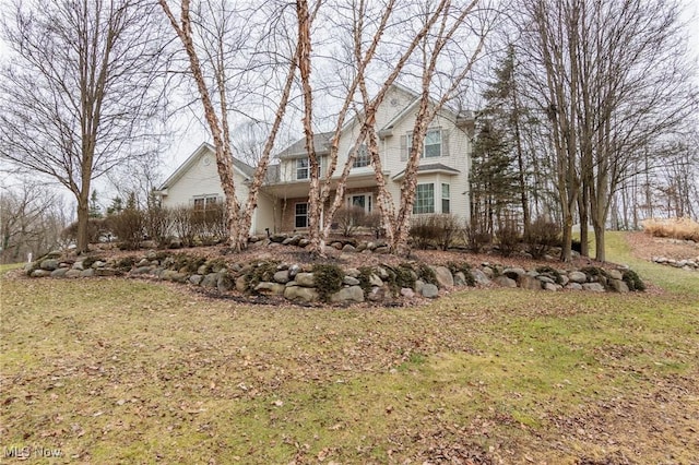 front facade with a front lawn