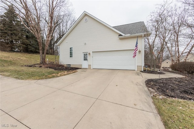 view of property exterior with a garage