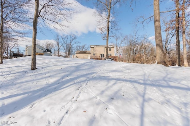 view of snowy yard