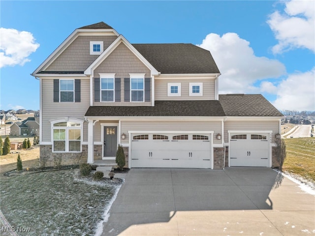 craftsman inspired home with a garage