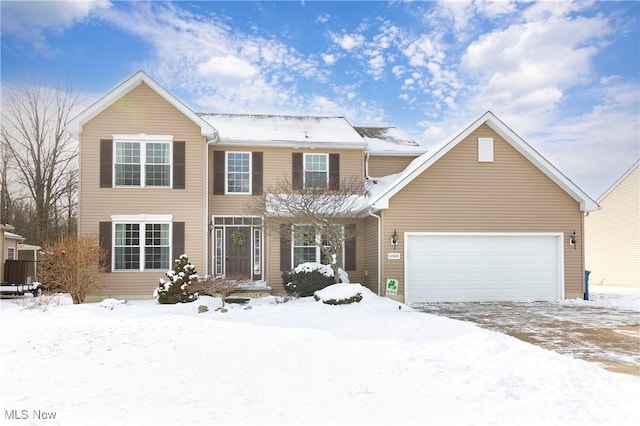 view of front of home with a garage