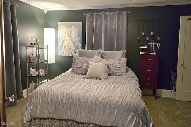 bedroom featuring crown molding and carpet flooring