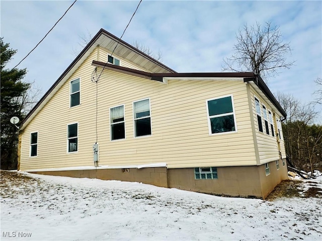 view of snow covered property