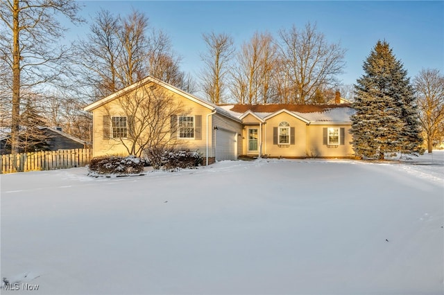 view of front of home featuring a garage