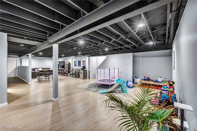 game room featuring hardwood / wood-style floors