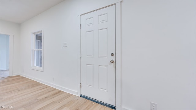 foyer entrance featuring light wood-type flooring