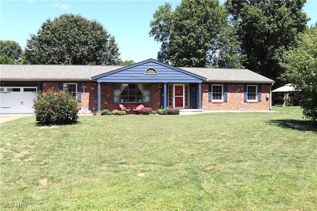 single story home featuring a garage and a front yard