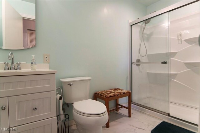 102 Chippewa Dr, Marietta, OH 45750 - bathroom featuring vanity, toilet, and walk in shower