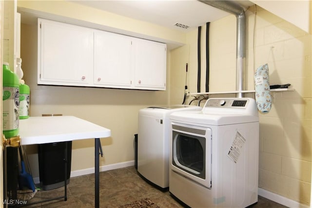 102 Chippewa Dr, Marietta, OH 45750 - laundry room featuring cabinets and independent washer and dryer