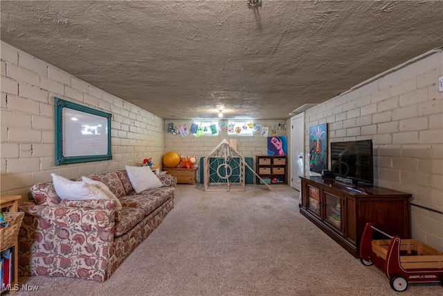 living room with concrete block wall