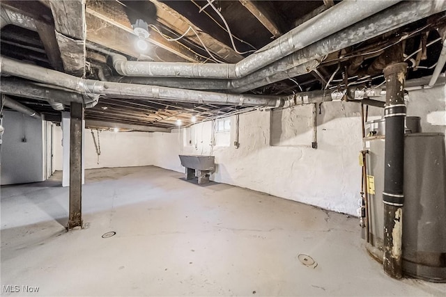 basement with sink and water heater