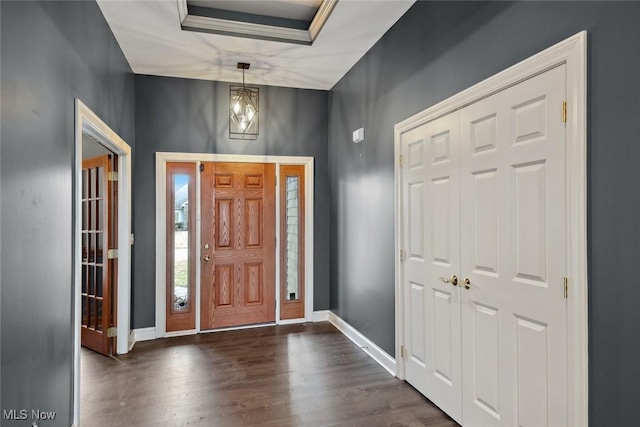 6470 Aberdeen Ln, Medina, OH 44256 - entrance foyer with dark wood finished floors, baseboards, and a chandelier