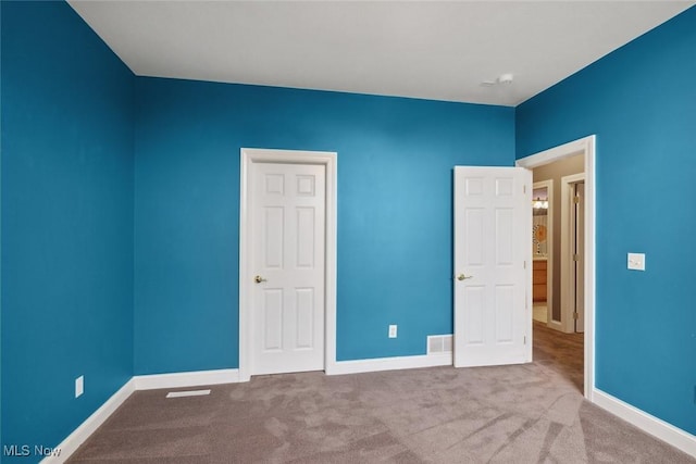 6470 Aberdeen Ln, Medina, OH 44256 - unfurnished bedroom featuring carpet floors and baseboards