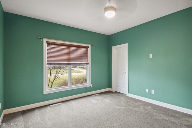 6470 Aberdeen Ln, Medina, OH 44256 - carpeted spare room with baseboards and a ceiling fan