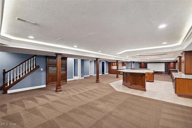 6470 Aberdeen Ln, Medina, OH 44256 - kitchen featuring a tray ceiling, open floor plan, recessed lighting, a textured ceiling, and a center island