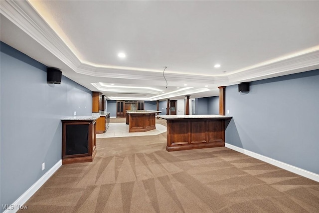 6470 Aberdeen Ln, Medina, OH 44256 - indoor wet bar featuring a raised ceiling, light colored carpet, ornamental molding, recessed lighting, and baseboards