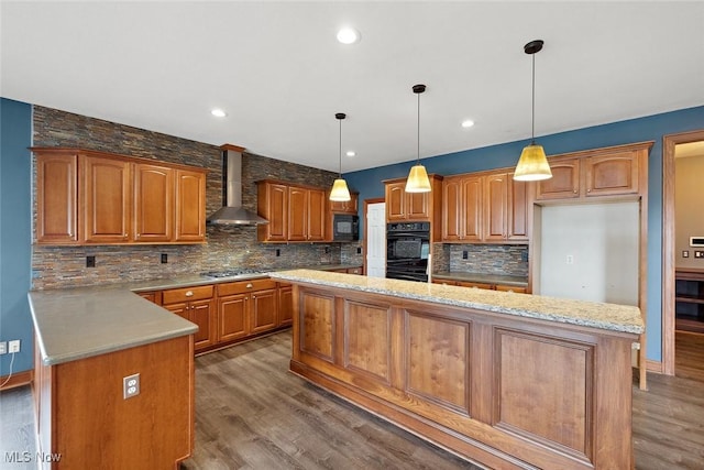 6470 Aberdeen Ln, Medina, OH 44256 - kitchen featuring wall chimney exhaust hood, black appliances, backsplash, brown cabinets, and wood finished floors
