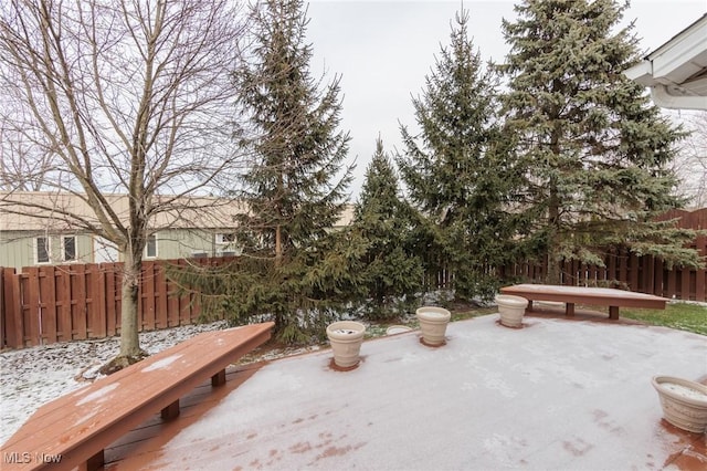 view of patio / terrace featuring fence