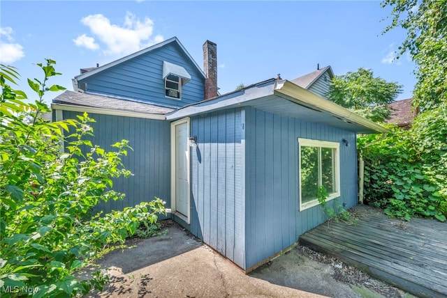 exterior space featuring a wooden deck