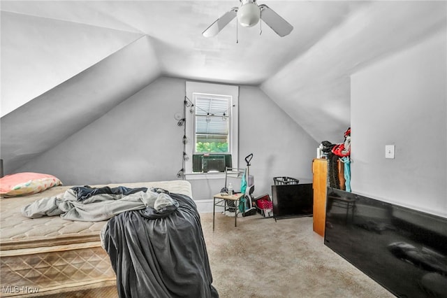 carpeted bedroom featuring vaulted ceiling and ceiling fan