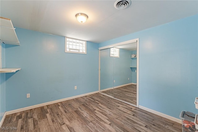 interior space with hardwood / wood-style floors