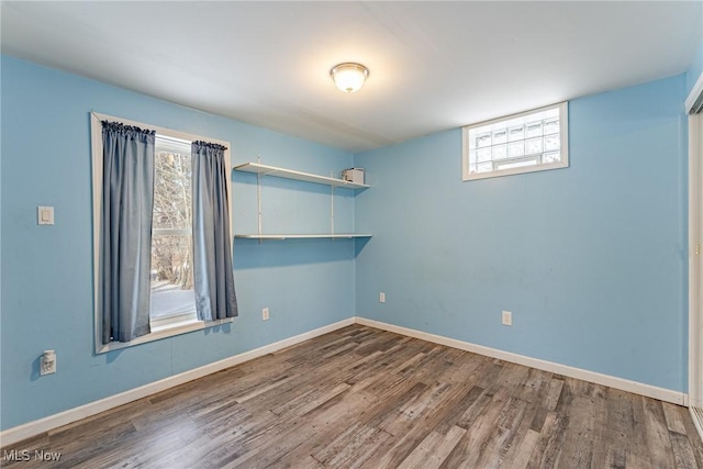 spare room featuring hardwood / wood-style flooring