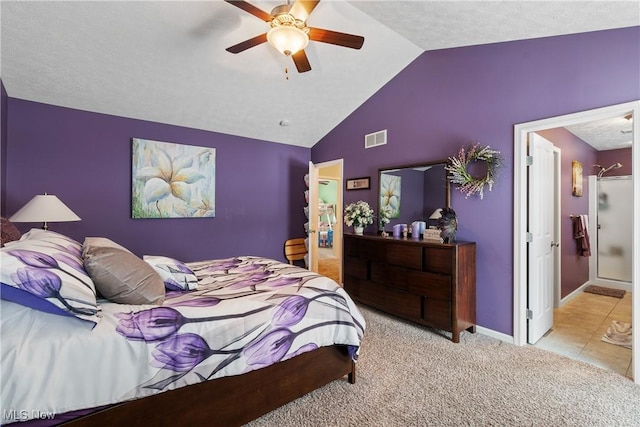 bedroom featuring baseboards, visible vents, light colored carpet, lofted ceiling, and ceiling fan