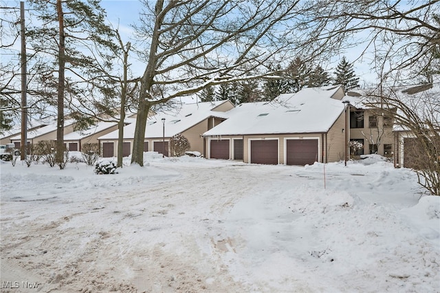 exterior space featuring a detached garage