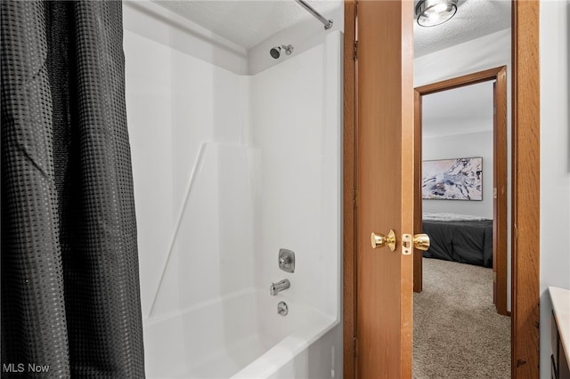 ensuite bathroom featuring ensuite bath, shower / bathtub combination with curtain, and a textured ceiling