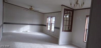 carpeted empty room with ceiling fan