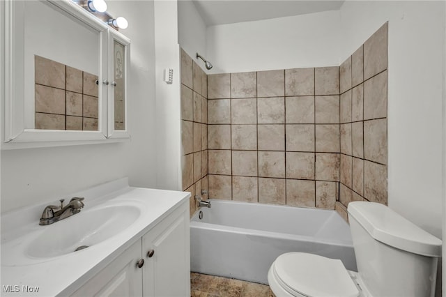 full bathroom featuring toilet, shower / bathtub combination, and vanity