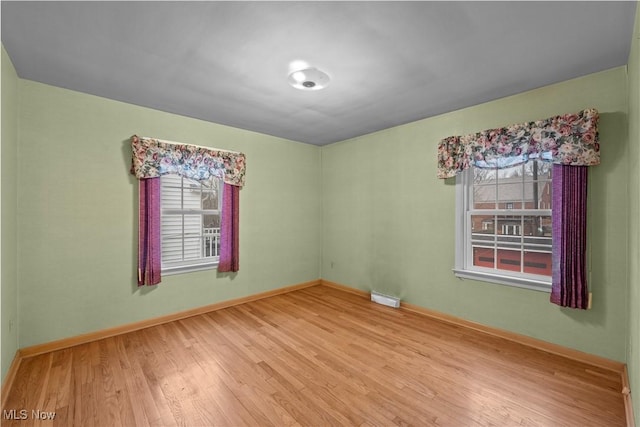 19951 Fairmount Blvd, Shaker Heights, OH 44118 - unfurnished room with light wood-type flooring, plenty of natural light, and baseboards