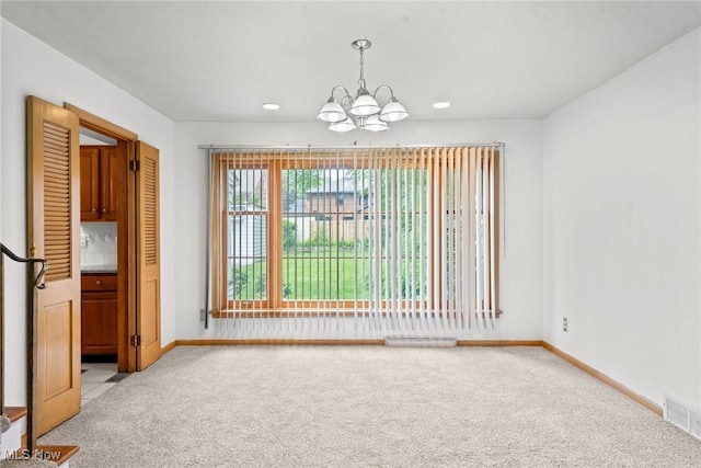 19951 Fairmount Blvd, Shaker Heights, OH 44118 - unfurnished dining area with light colored carpet, a chandelier, baseboards, and recessed lighting