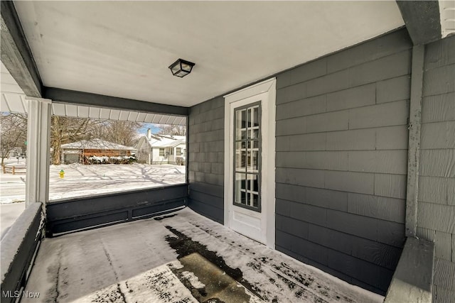 view of snow covered patio