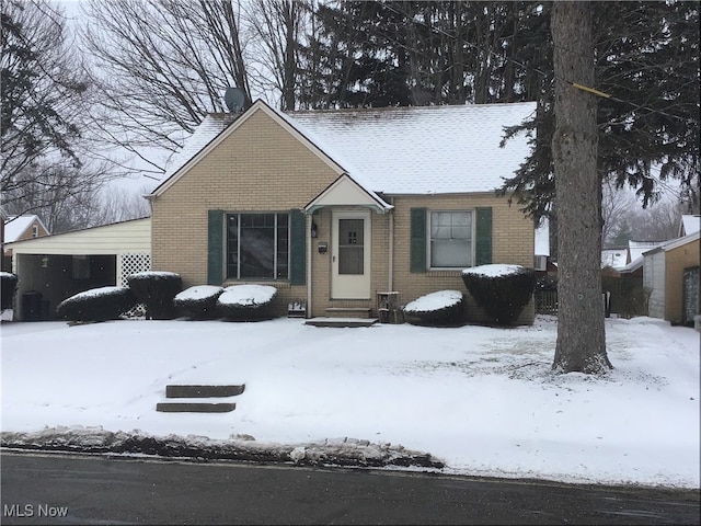 view of front of home with brick siding