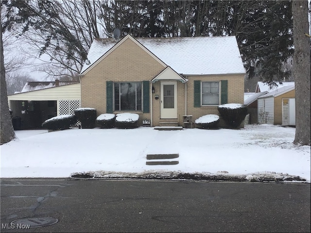 view of front of house with brick siding