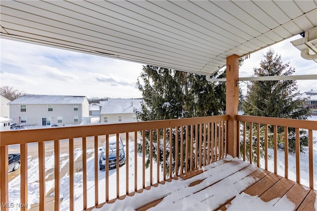 view of snow covered deck