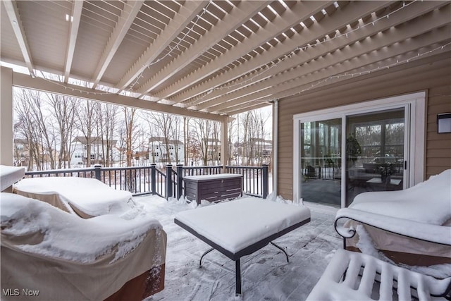 view of snow covered deck