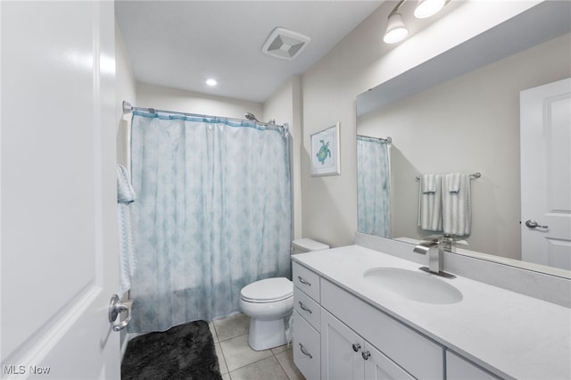 bathroom with visible vents, toilet, tile patterned floors, shower / bathtub combination with curtain, and vanity