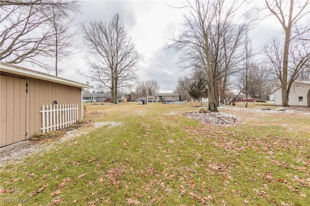 view of yard with fence