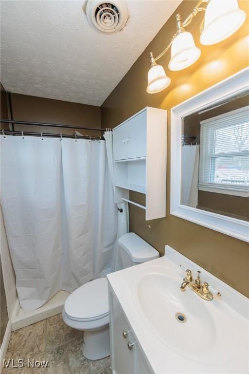 bathroom with toilet, curtained shower, visible vents, and vanity