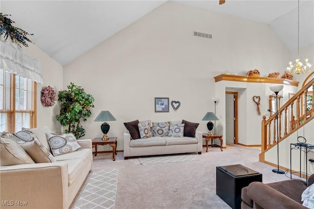 1925 N Lipkey Rd, North Jackson, OH 44451 - living room featuring high vaulted ceiling, light carpet, stairs, a chandelier, and baseboards