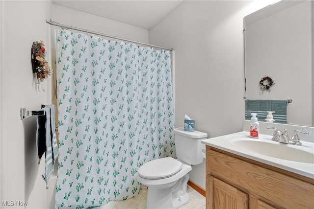 bathroom with toilet, a shower with curtain, tile patterned flooring, and vanity