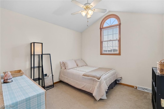 1925 N Lipkey Rd, North Jackson, OH 44451 - bedroom with light carpet, baseboards, vaulted ceiling, and ceiling fan